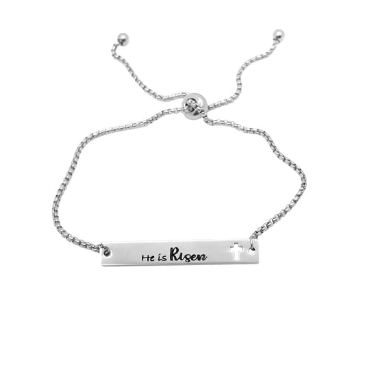 He Is Risen Cutout bar adjustable bracelet. Available is silver and gold color.